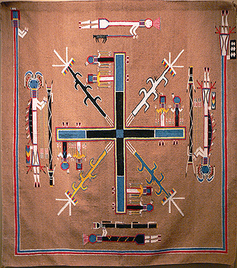 ‘Whirling Logs, part of the Night Chant’
Navajo tapijt na een zandschilderji, 1940 
Tulsa, Oklahoma, Gilcrease Museum
JanManu 2012 commons.wikimedia